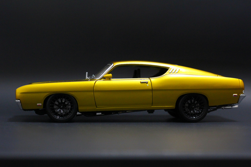 Illustration for article titled Car Week: Custom 1/18 Maisto Ford Torino Talladega Coyote